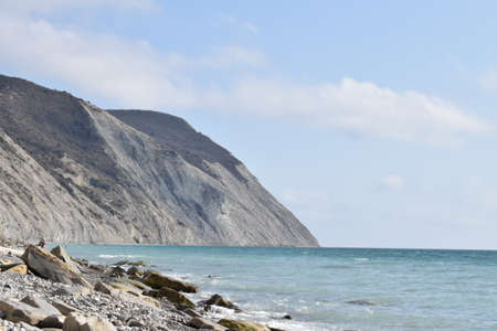Types of the Black Sea. The outskirts of Anapa. Mountains and rocks, pebble beach, seagulls.の写真素材