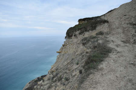 Types of the Black Sea. The outskirts of Anapa. Mountains and rocks, pebble beach.の写真素材