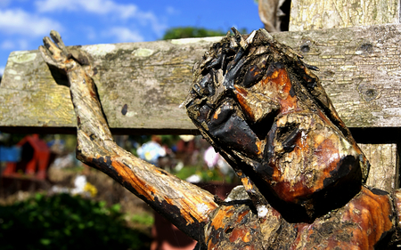 Christ carved in wood of ancient tomb in the cemetery of Xalapa Veracruz, Mexico, 2017の写真素材