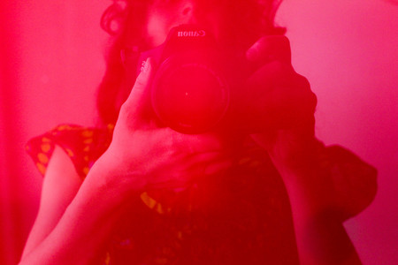 Reflection Photo in a Red Glassの写真素材