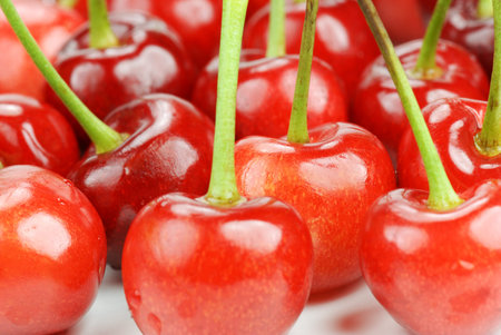 crowded group of ripe cherries