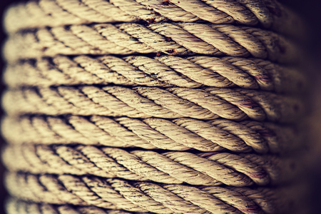 Macro photography. Texture of rope. Hawser coiled around core.  Close-up as  background and texture of cable from natural material.の写真素材