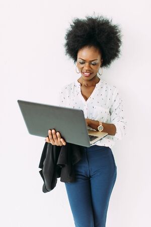 Young african american business woman using the laptopの写真素材