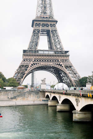 Paris, France. Beautiful view of the Eiffel Tower, Seine river and bridge on a summer day.の写真素材