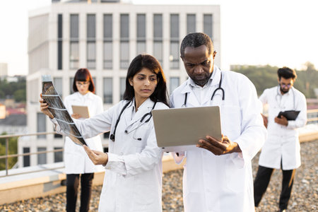 International group of health care workers at city rooftop.の写真素材
