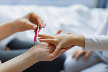 Close-up view of little girls hand.の写真素材