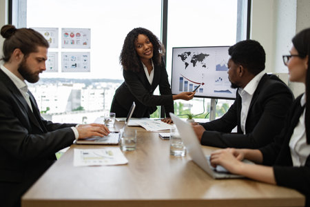 Diverse business meeting with presentation and discussion