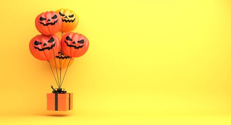 Happy Halloween design creative concept celebration holiday, pumpkin balloon, gift box on orange background. 3D rendering illustration.の写真素材