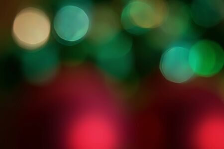 Abstract christmas new year bokeh lights green backgroundの写真素材