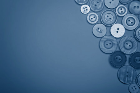 Buttons of different colors in blue tones. Flat lay.