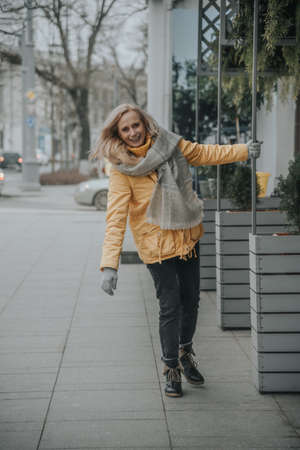 Aged pretty woman with blond hair. Lifestyle.の写真素材