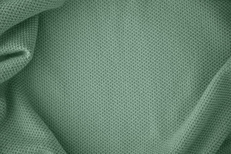 Texture of knitted fabric in trendy turquoise mint colorの写真素材