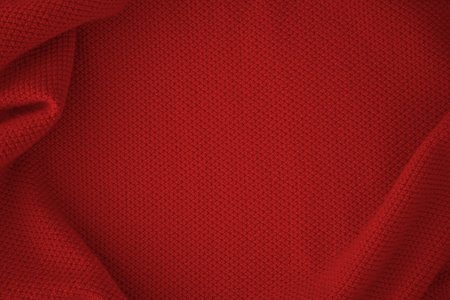 Texture of knitted fabric in trendy red lava colorの写真素材