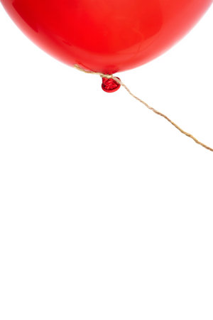 Red balloon on a string. creative vertical banner. copyspace. Place for text.の写真素材