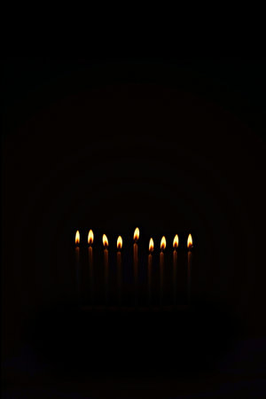 Religious image of Jewish holiday Hanukkah with candles of menorah on black background. Copy space. Place for text.の写真素材