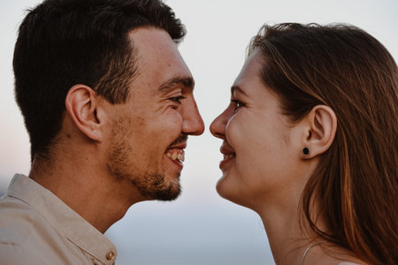 Portrait of beautiful young loving couple man of Middle Eastern appearance and a Caucasian woman...