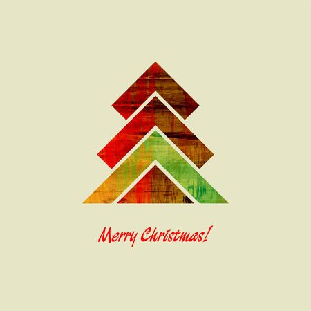 art christmas graphic tree in green, red, orange and gold colors isolated on beige background with space for textの写真素材
