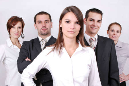 Successful Business Team in a office environment looking satisfied.の写真素材