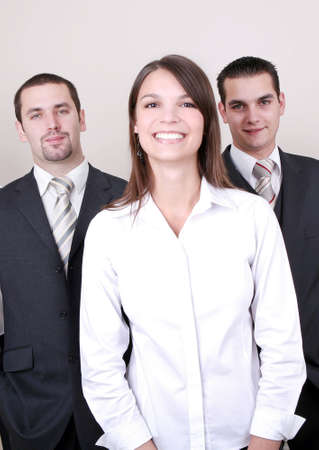 Successful Business Team in a office environment looking satisfied.の写真素材