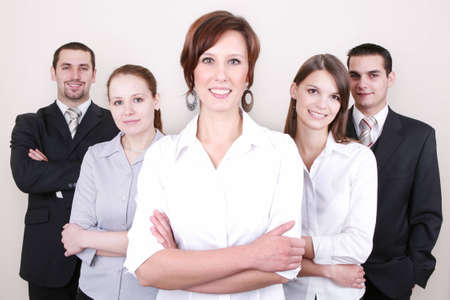 Successful Business Team in a office environment looking satisfied.の写真素材