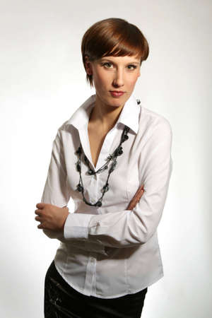 Young business woman, arms crossed, portrait の写真素材