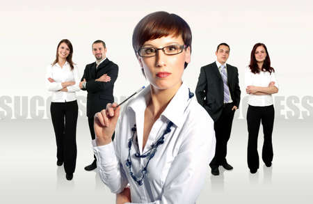 business team with a businesswoman leading itの写真素材