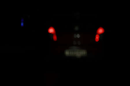 blurry abstract background on a rainy nightの写真素材