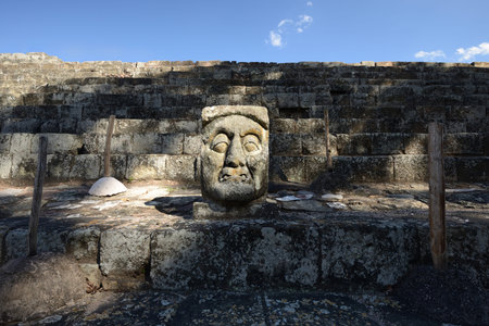 The stone head in the ancient Mayan city of Copan in Honduras の写真素材