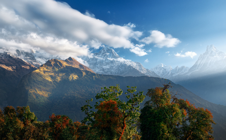 Scenic Himalayas landscape with and mountain ranges on sunrise. Natural mountain background. Peak Machapuchare, Nepal.の写真素材