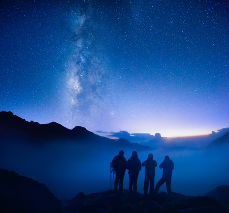Group of tourists looking at the starry sky in mountains of the Himalayas.
Beautiful inspirational night landscape, trekking and activity.の写真素材