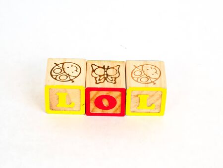 Vintage alphabet blocks spelling out LOLの写真素材