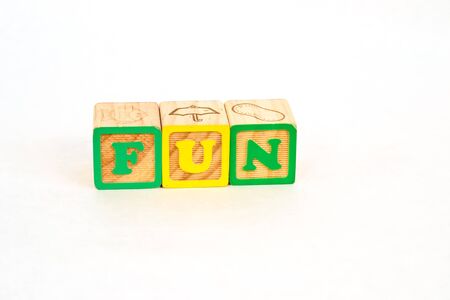 Vintage alphabet blocks spelling out FUNの写真素材