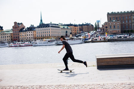 Urban life. Cool skateboarder outdoorsのeditorial素材