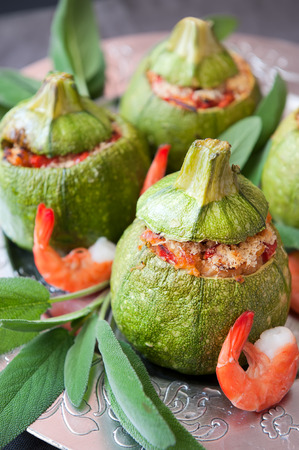 zucchini stuffed with shrimp and tomato sauceの写真素材