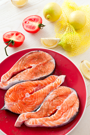 Fresh salmon fish steaks, ready to grill.の写真素材