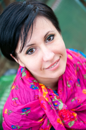 Close up Portrait of a happy positive woman outdoors の写真素材