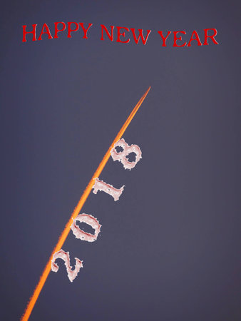Happy New year 2018 with Aircraft contrail and wavy beautiful illustration dark blue skyの写真素材
