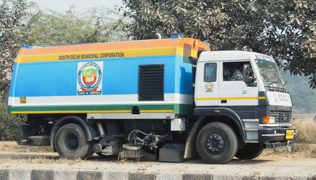 Vacuum dust cleaner sweeper truck Delhi India Dec 30 2017 South Delhi Municipal Corporationのeditorial素材