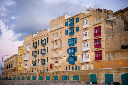 Street with colorful balconies in the historical part on the island of Maltaの写真素材