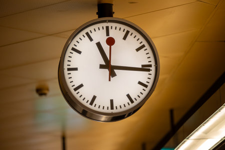 Close-up of a street clock at a train station with a second handの写真素材