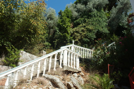 romantic staircase of white marble Petrovac na Moru, Montenegro is a popular tourist destination Marble parapet banister of a Venetian bridgeの写真素材