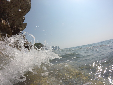 rocky coast, strong wave-clear Adriatic sea, summer blue sky a lovely stayの写真素材