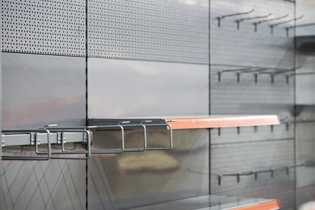the system for fixing goods on the shelves in the store,mounting on racks for the itemの写真素材