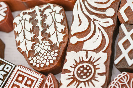 carved wooden stamps of various designsの写真素材