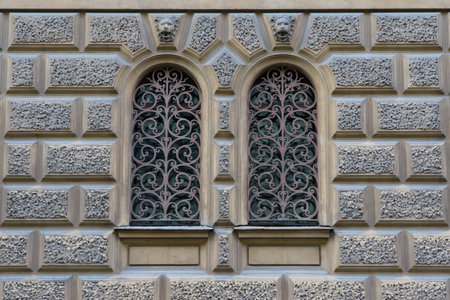 Vintage window with a lattice on old building