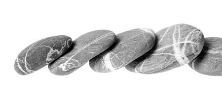 Pile of pebbles isolated on white backgroundの写真素材
