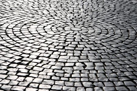 Cobblestone road in a view of the morning sunの写真素材