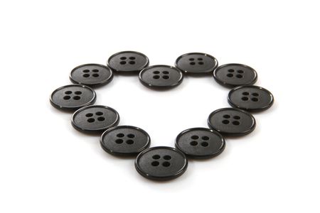 Icon heart from buttons on white backgroundの写真素材