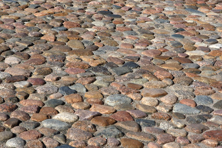 Detail of a cobblestone old road landscape