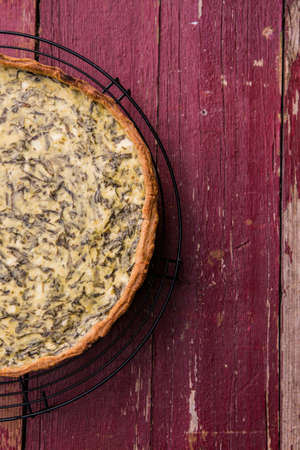Quiche with spinach - traditional dish of french cuisine. Spinach tartの写真素材
